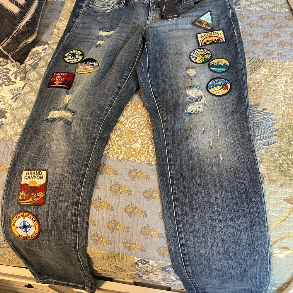 Torrid premium road trip patch boyfriend jeans.  Size 12T Super soft NWT!